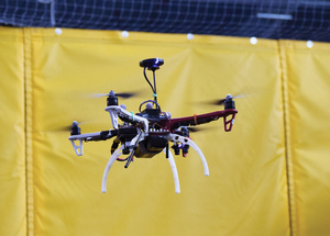 Researchers use a cage on the first floor of the Syracuse Center of Excellence to test drones. 